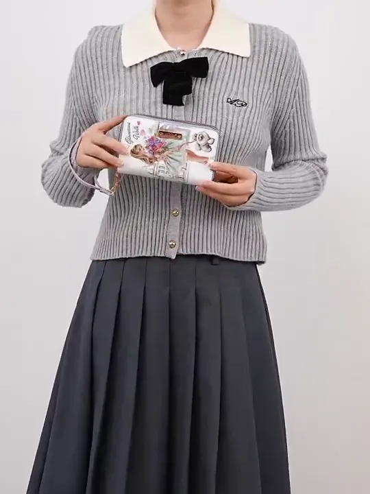 Video de NK25053 GLAMOROUS WALK-BLACK MONEDERO CON CREMALLERA Y ASA DE MUÑECA